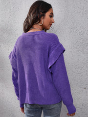 Purple ribbed knit pullover sweater with ruffled sleeves.
