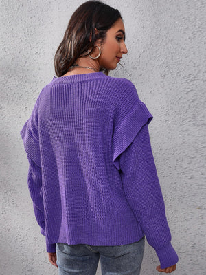 Purple ribbed knit pullover sweater with ruffled sleeves.