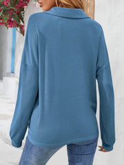 Dusty Blue waffle knit henley blouse with collar and long sleeves.