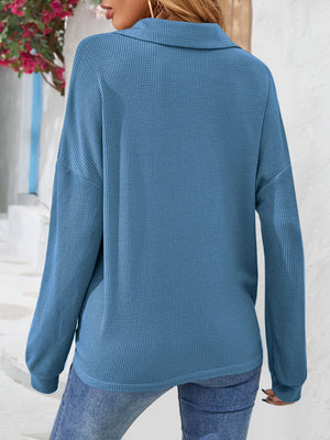 Dusty Blue waffle knit henley blouse with collar and long sleeves.
