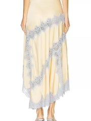 Beige lace cami and skirt ensemble with lace trim detail