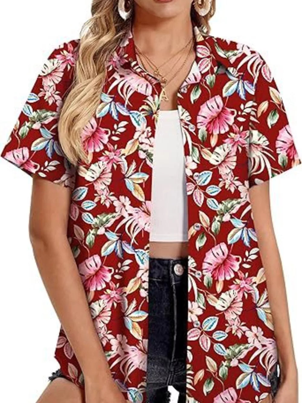 Red tropical hibiscus print button-up shirt with short sleeves and a collar.
