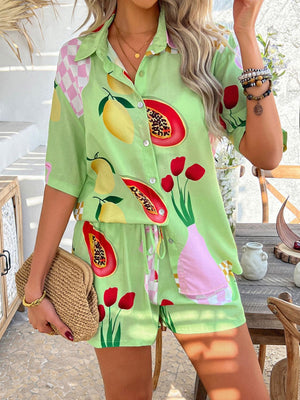 Lime green fruit and flower print button-up shirt and shorts set with drawstring waist.