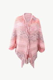 Blush pink acrylic cape with textured stripes and fringe detail.