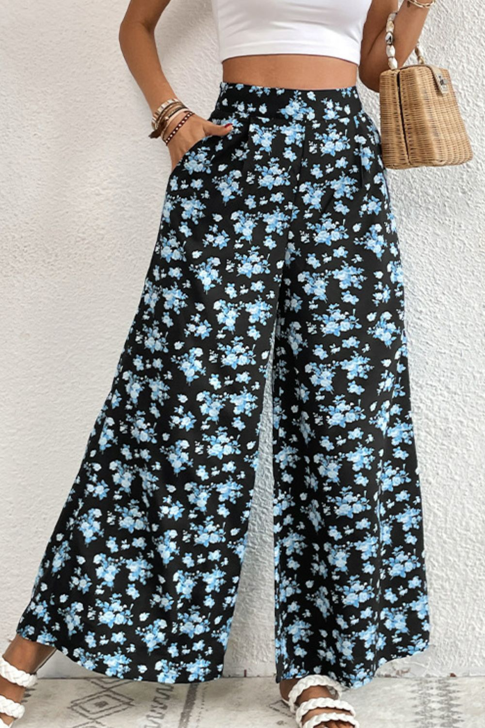 Midnight floral palazzo trousers with a wide leg and high waist.