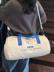 Off-white pu leather sporty duffel bag with blue trim and bold graphic logo.