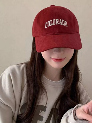 Burgundy cotton baseball cap with embroidered COLORADO text.