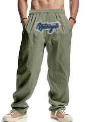 Men's military green drawstring sweatpants with a motorcycle graphic patch.