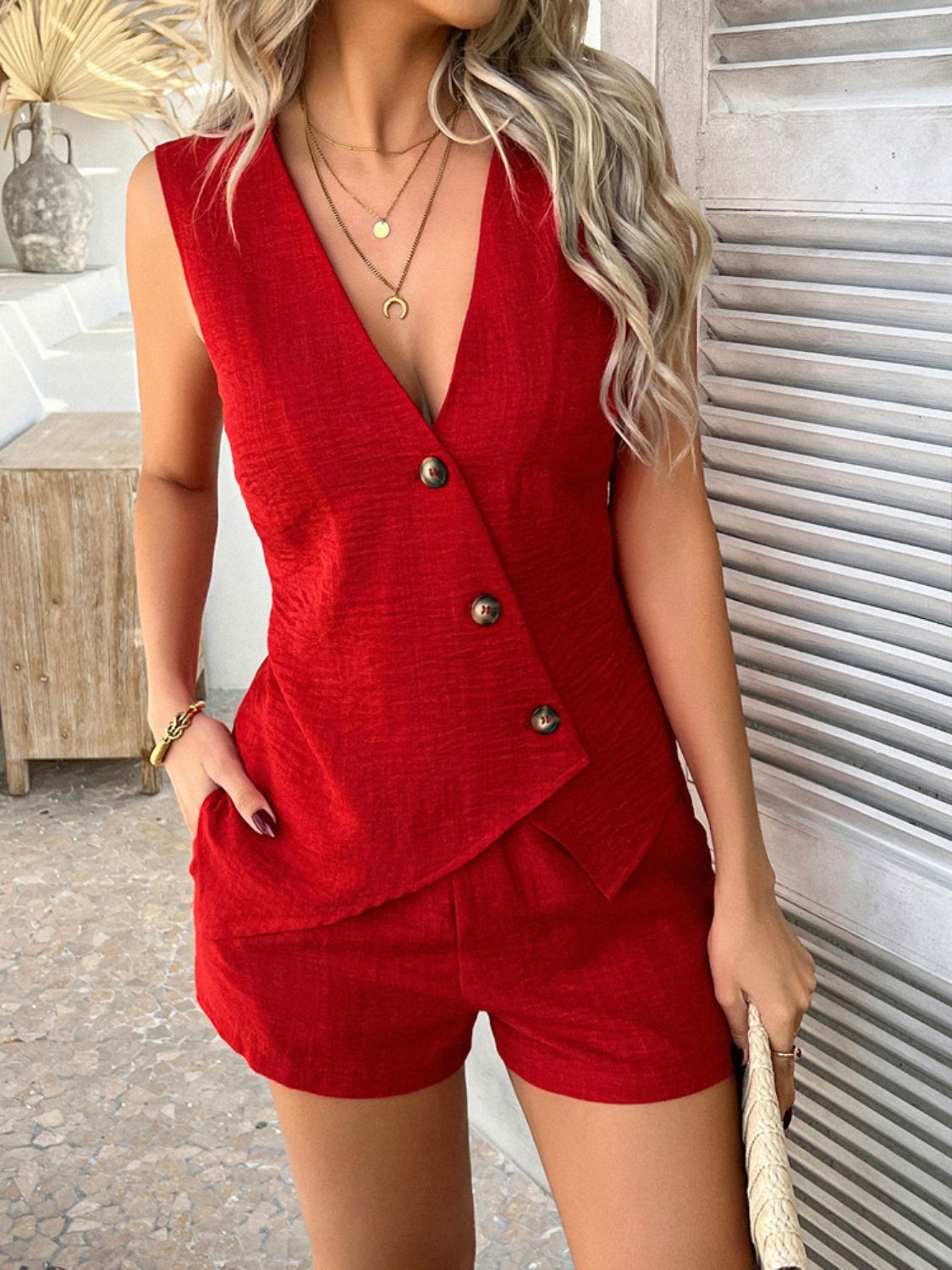 Scarlet linen vest with asymmetric button front and matching shorts