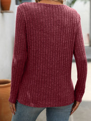 Burgundy ribbed knit henley top with long sleeves and a keyhole neckline.