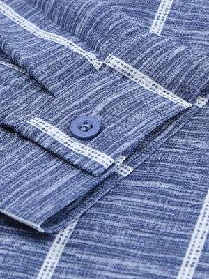 Dusty blue striped buttoned blouse with a V-neck and textured fabric detail.