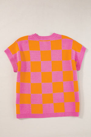 Checkerboard knit cap-sleeve top in pink and orange plaid with a crew neck.
