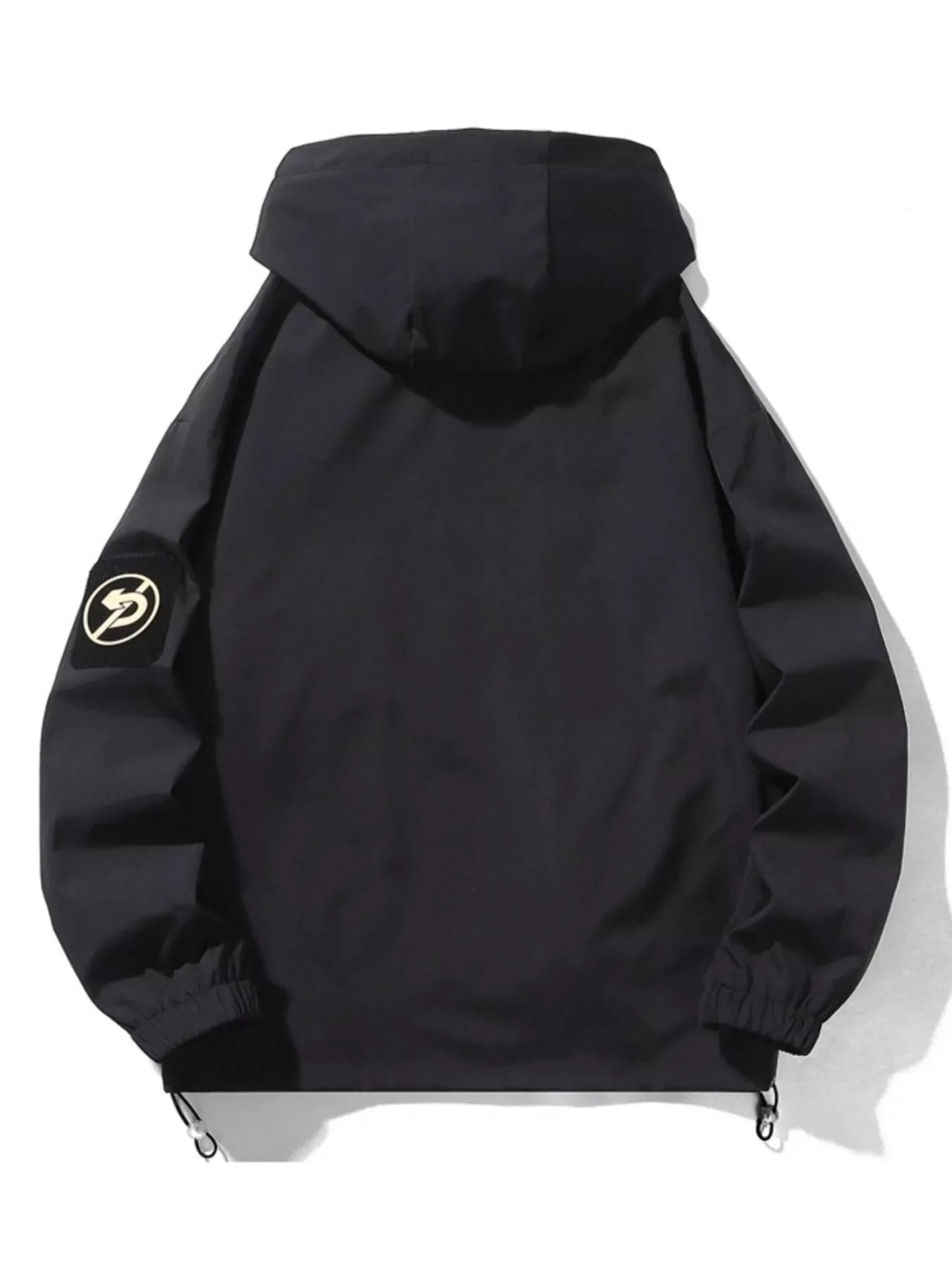Black hooded utility jacket with drawstring hem and patch detail on sleeve