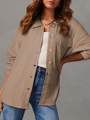 Textured oversized button-down shacket in Camel with button details and a collared neckline.