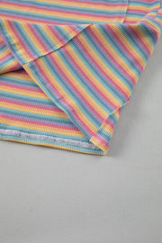 Rainbow stripe loungewear set detail, soft cotton fabric, relaxed fit.