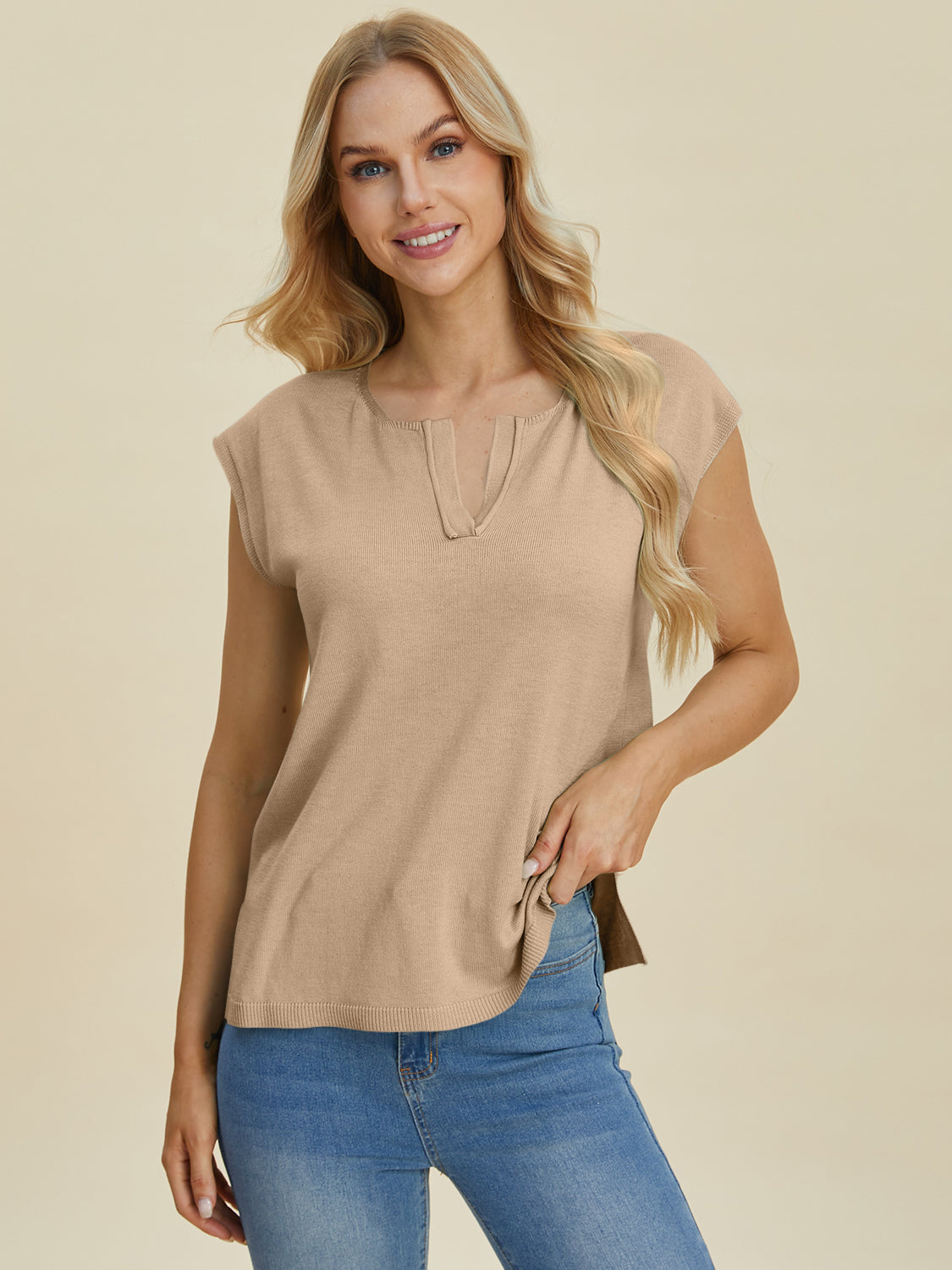 Keyhole neckline knit tee in caramel with cap sleeves and a split hem.