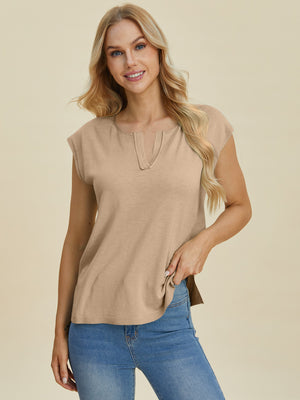 Keyhole neckline knit tee in caramel with cap sleeves and a split hem.