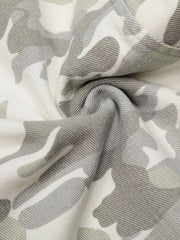 Camouflage wide-leg cargo pants in white and grey with a button fly and belt loops.
