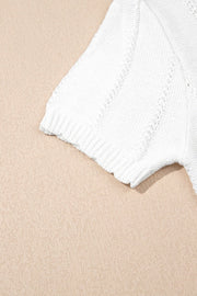 White eyelet knit puff sleeve blouse with textured detail