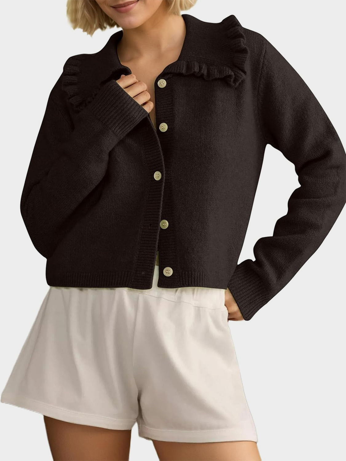 Black frilled collar knit cardigan with button front.