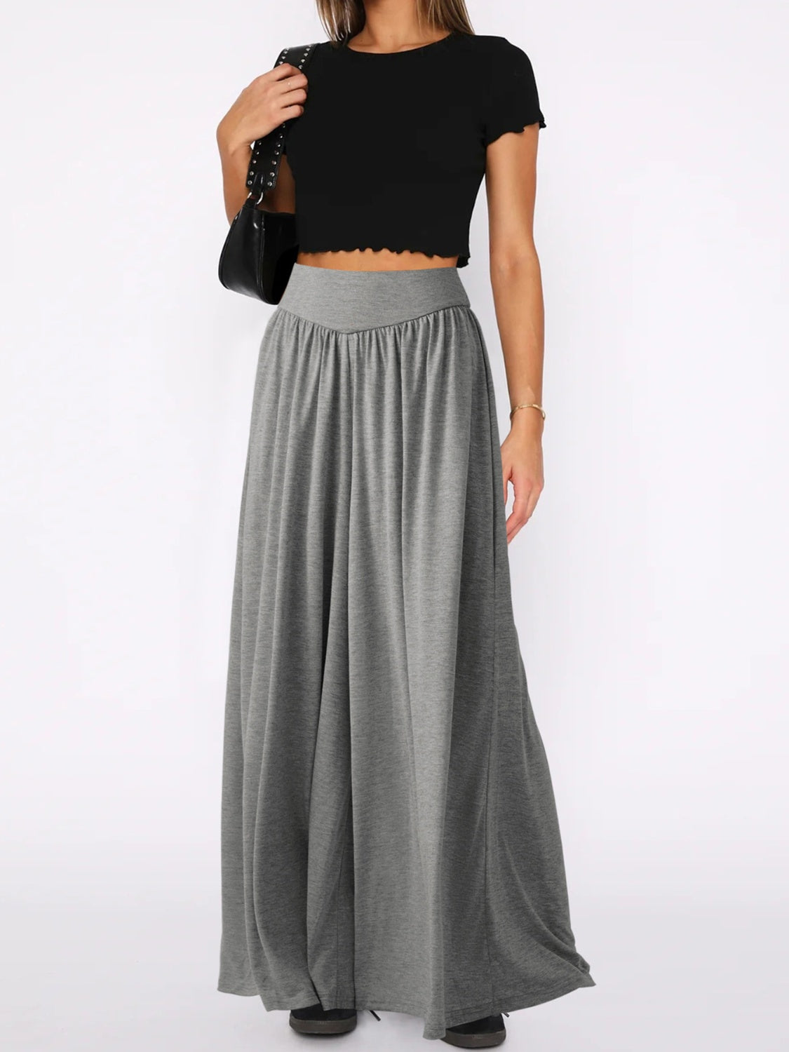 Drape-front wide-leg jersey trousers in gray with a high waist and flowing silhouette.