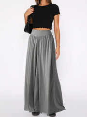 Drape-front wide-leg jersey trousers in gray with a high waist and flowing silhouette.