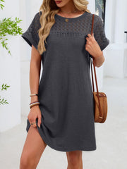 Dark gray t-shirt dress with sheer lace yoke and short sleeves, above knee length