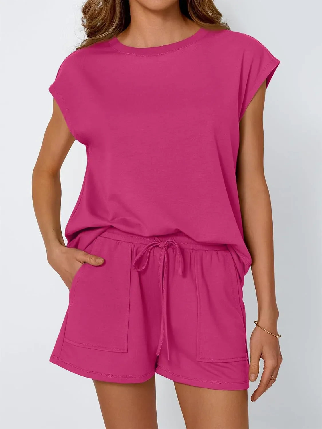 Relaxed cap-sleeve tee and drawstring shorts set in Deep Rose, with side pockets.