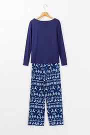 Navy lounge set with festive print pants and long sleeve top.