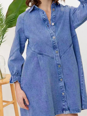 Dusty blue denim button-down dress with ruffled cuffs and a collared neckline.