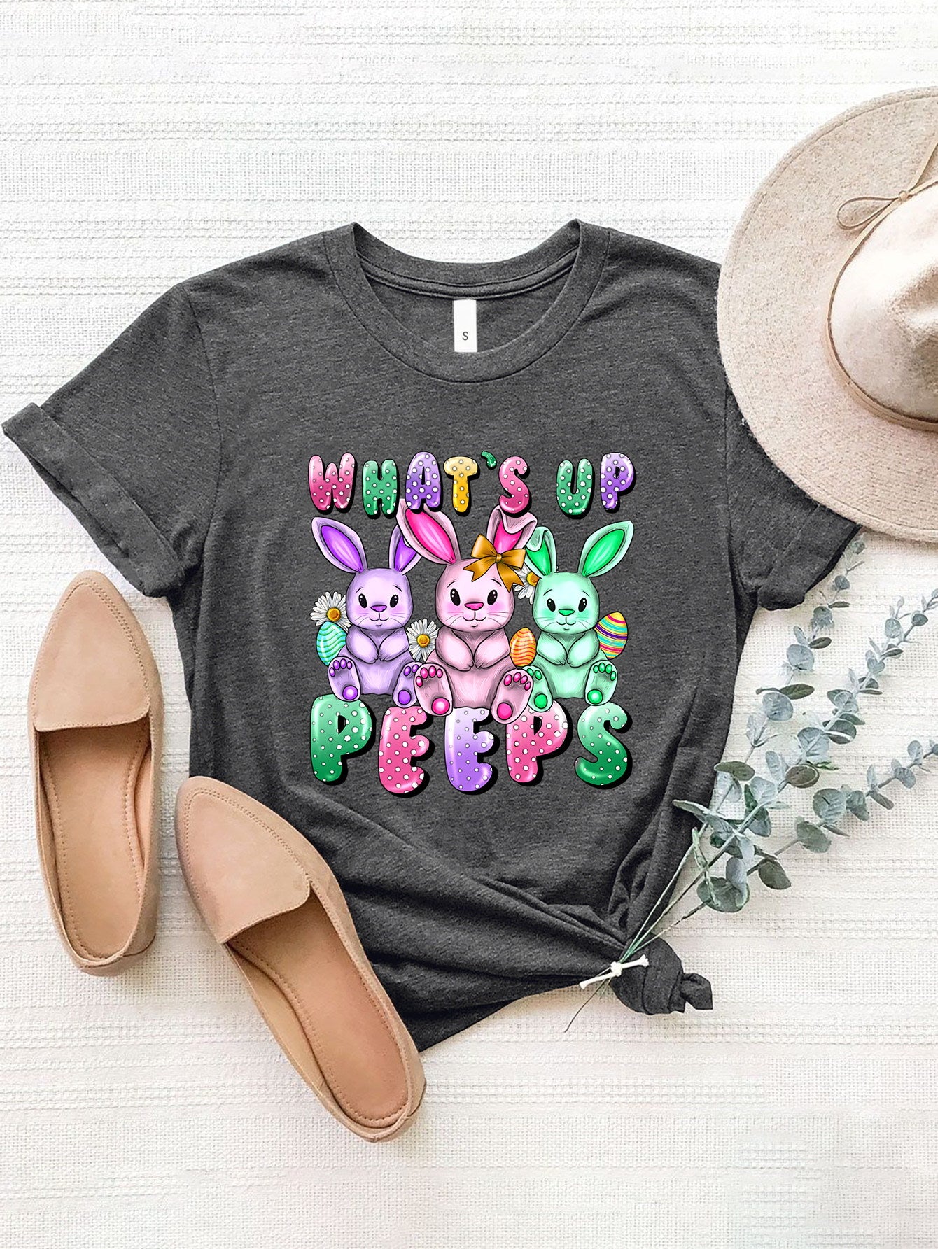 Dark Gray Easter Bunny Graphic Tee with "What's Up Peeps" text and cartoon bunnies.