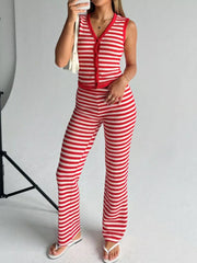 Red and white striped knit V-neck buttoned sleeveless top and flared pants set.
