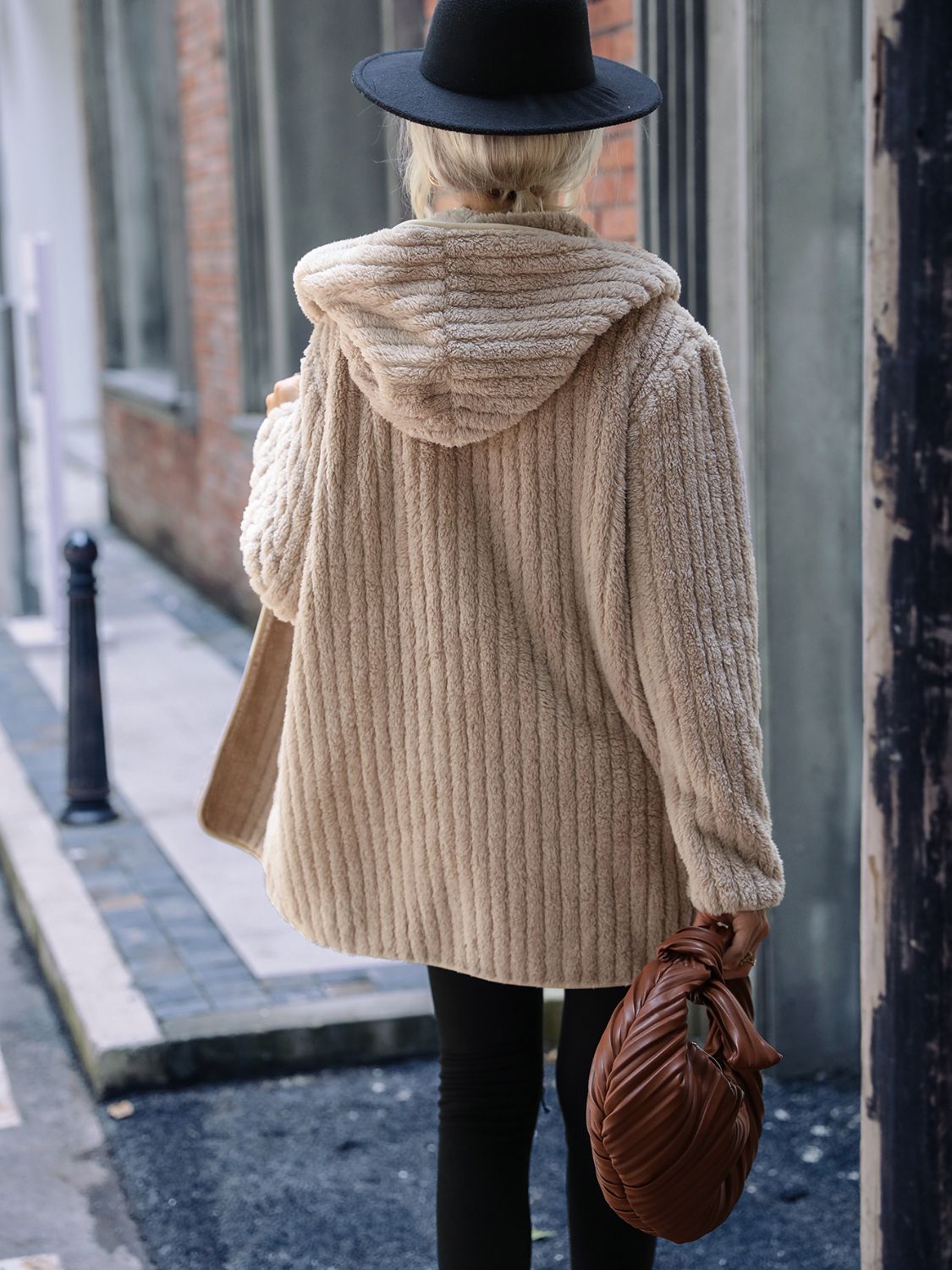 Sand textured teddy hooded open coat with vertical ribbing detail.
