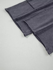 Maternity cropped wide-leg pants in charcoal cotton with visible seams and a washed finish.