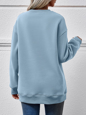 Misty Blue crewneck sweatshirt with relaxed fit and ribbed cuffs and hem.