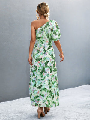 Light green tropical print one-shoulder maxi dress with balloon sleeves and tiered skirt.
