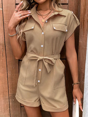 Camel utility romper with tie-waist, collared, short sleeves, and button-down front.