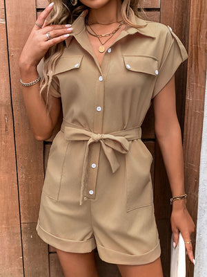 Camel utility romper with tie-waist, collared, short sleeves, and button-down front.