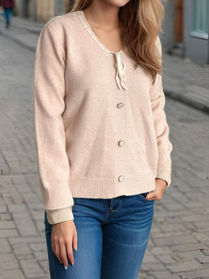 Ribbon-trimmed button-front knit cardigan in light pink with tie neck detail.
