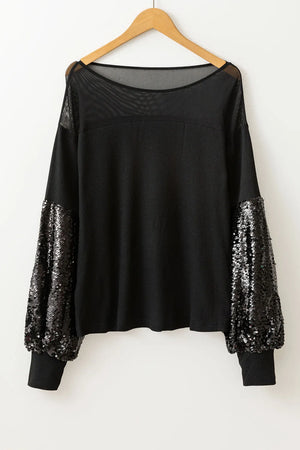 Black ribbed knit top with mesh neckline and sequin balloon sleeves.