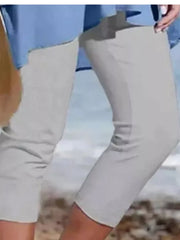 Light gray cropped leggings with a casual fit, hitting just above the knee.