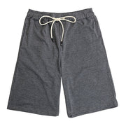Relaxed fit culotte lounge shorts in charcoal grey with a drawstring waist and pockets.