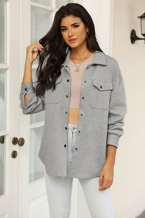 Textured overshirt in grey with patch pockets and a diamond pattern.