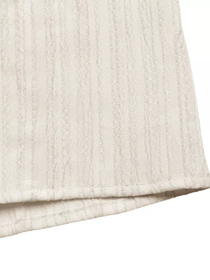 Cream tiered cami dress with textured vertical stripes and contrast trim detail