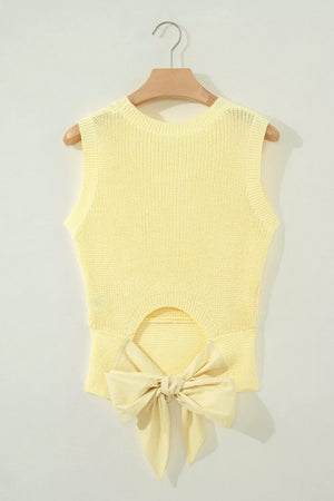 Yellow knit sweater vest with back cutout and large bow detail