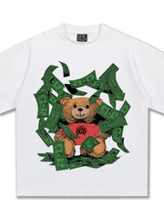 White cotton blend t-shirt with teddy bear graphic surrounded by money.