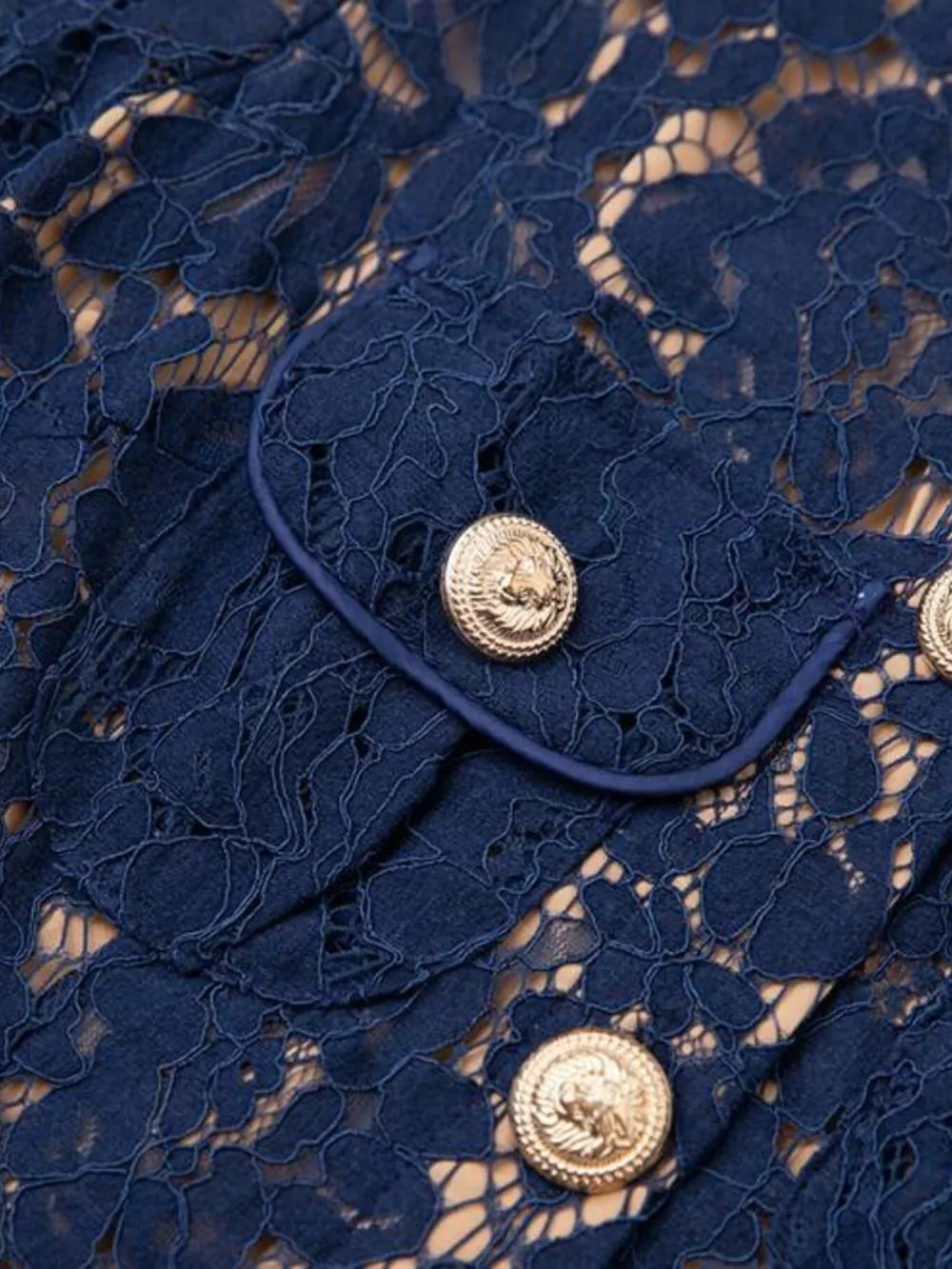 Navy lace midi dress with gold button details and pocket flap.