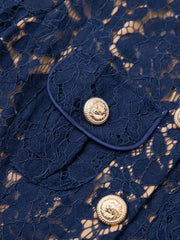 Navy lace midi dress with gold button details and pocket flap.