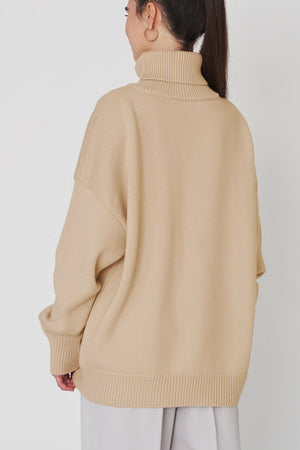 Relaxed roll-neck sweater in Khaki with a boxy knit cut and ribbed cuffs and hem.