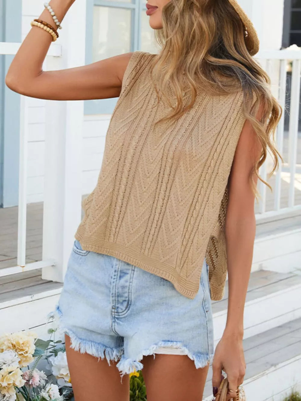 Chevron knit sleeveless sweater vest in apricot with a relaxed fit and open knit detail.